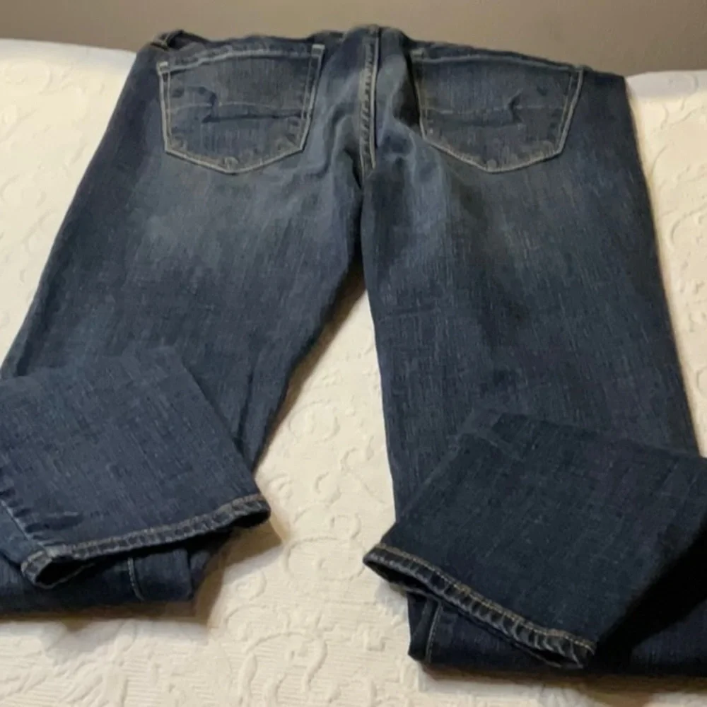 American Eagle Outfitters Women's Skinny Jeans - Dark Blue Wash Distressed.